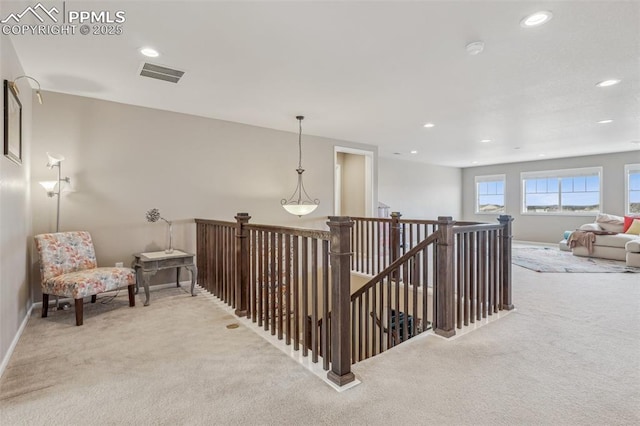 3197 Cool Meadow Pl, Castle Rock, CO 80104 - hallway featuring light carpet, an upstairs landing, recessed lighting, and baseboards
