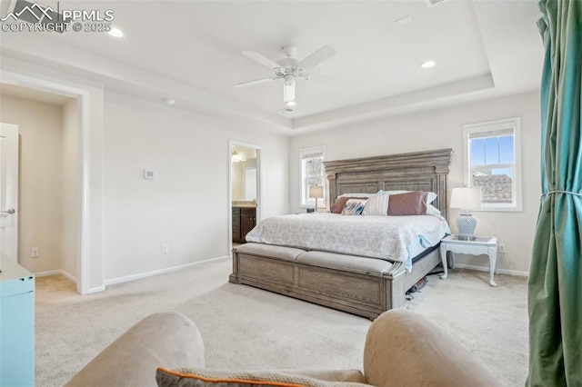 3197 Cool Meadow Pl, Castle Rock, CO 80104 - carpeted bedroom featuring baseboards, a tray ceiling, ceiling fan, connected bathroom, and recessed lighting