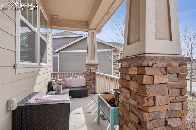 3197 Cool Meadow Pl, Castle Rock, CO 80104 - view of patio / terrace featuring outdoor lounge area and covered porch