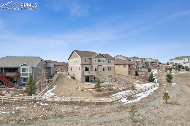 3197 Cool Meadow Pl, Castle Rock, CO 80104 - view of front of house with a residential view, stairway, and fence