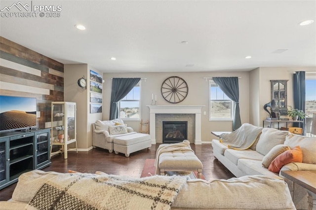 3197 Cool Meadow Pl, Castle Rock, CO 80104 - living area with recessed lighting, baseboards, a glass covered fireplace, and wood finished floors