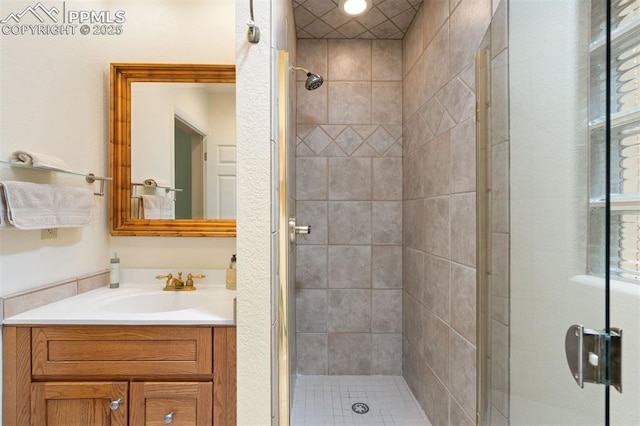 1303 Hermosa Way, Colorado Springs, CO 80906 - bathroom with a stall shower and vanity