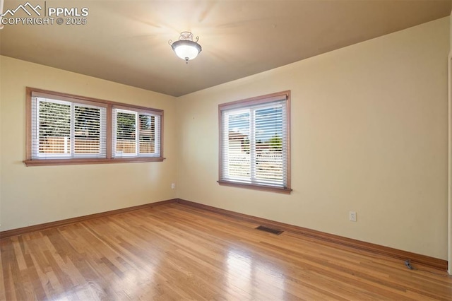 1303 Hermosa Way, Colorado Springs, CO 80906 - empty room with baseboards and light wood finished floors
