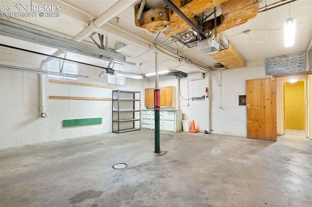 1303 Hermosa Way, Colorado Springs, CO 80906 - garage with a garage door opener