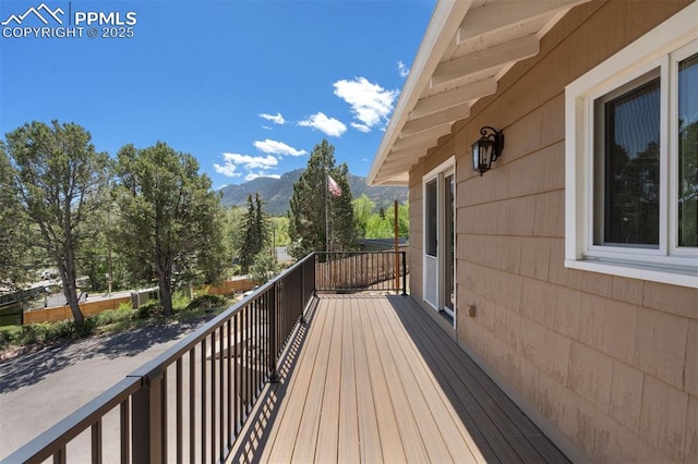 1303 Hermosa Way, Colorado Springs, CO 80906 - wooden terrace featuring a mountain view