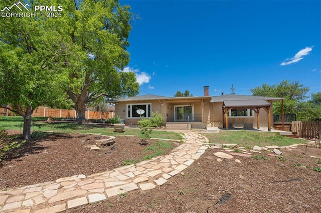 1303 Hermosa Way, Colorado Springs, CO 80906 - back of house featuring a patio