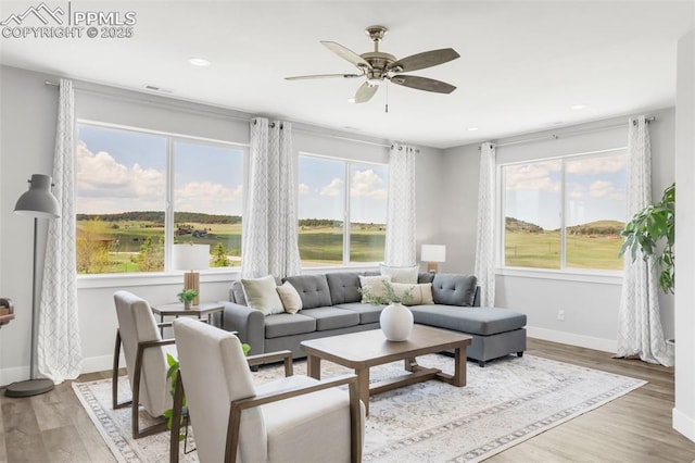 19887 Kershaw Ct, Monument, CO 80132 - living room with baseboards, a ceiling fan, wood finished floors, and recessed lighting