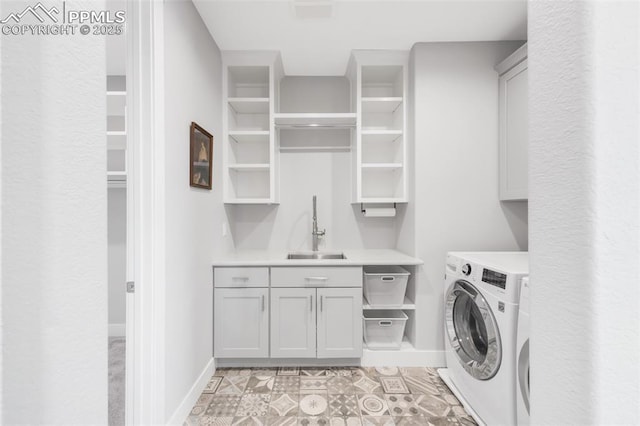 19887 Kershaw Ct, Monument, CO 80132 - washroom featuring cabinet space and baseboards