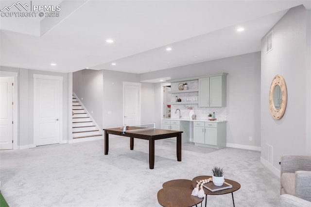 19887 Kershaw Ct, Monument, CO 80132 - living room with light carpet, stairway, recessed lighting, baseboards, and bar area