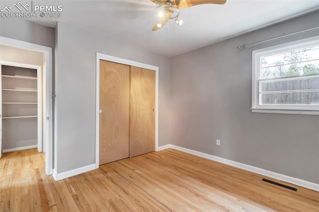 717 W Monroe St, Colorado Springs, CO 80907 - unfurnished bedroom with light wood-type flooring, baseboards, ceiling fan, and a closet