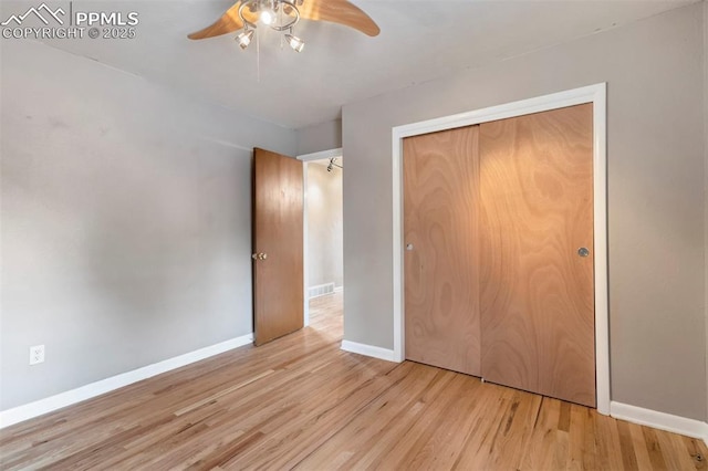 717 W Monroe St, Colorado Springs, CO 80907 - unfurnished bedroom with wood finished floors, baseboards, a closet, and ceiling fan