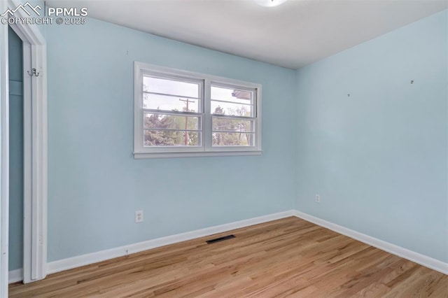 717 W Monroe St, Colorado Springs, CO 80907 - unfurnished room with light wood-style floors and baseboards