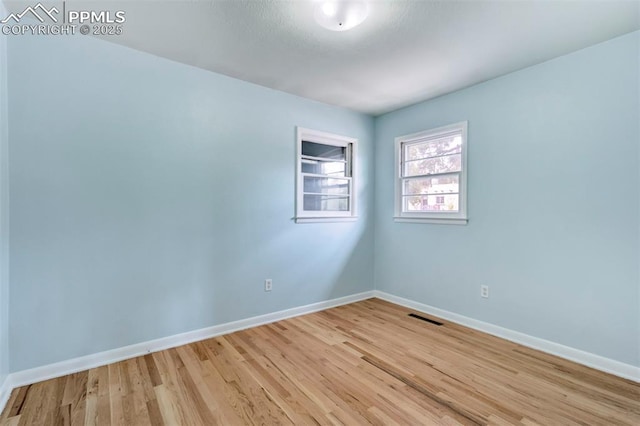 717 W Monroe St, Colorado Springs, CO 80907 - spare room with baseboards and light wood-type flooring