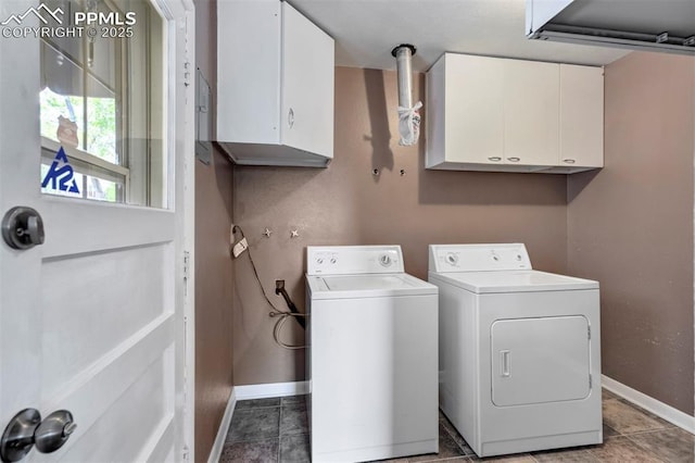 717 W Monroe St, Colorado Springs, CO 80907 - washroom featuring cabinet space, baseboards, washing machine and clothes dryer, and light tile patterned flooring