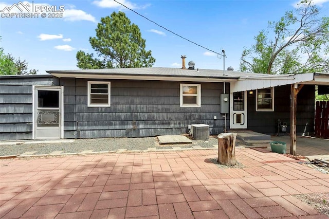 717 W Monroe St, Colorado Springs, CO 80907 - back of house with a patio area, central AC unit, and cooling unit