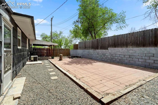 717 W Monroe St, Colorado Springs, CO 80907 - fenced backyard featuring a patio area