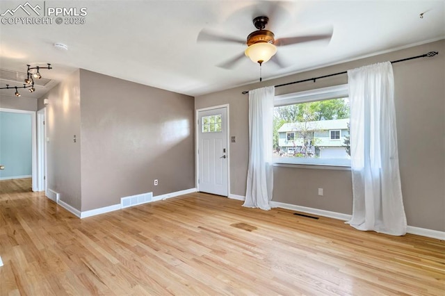 717 W Monroe St, Colorado Springs, CO 80907 - foyer featuring wood finished floors, baseboards, and a ceiling fan