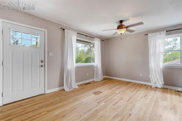 717 W Monroe St, Colorado Springs, CO 80907 - entryway featuring wood finished floors, baseboards, and a ceiling fan