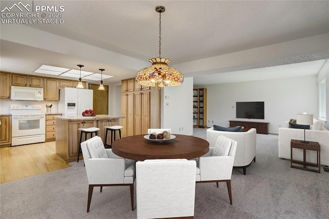 1559 Sausalito Dr, Colorado Springs, CO 80907 - dining room featuring light colored carpet