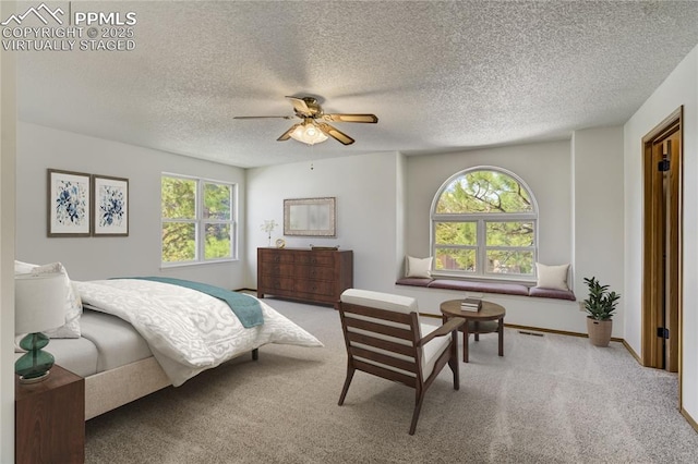 1559 Sausalito Dr, Colorado Springs, CO 80907 - carpeted bedroom featuring a textured ceiling, ceiling fan, and baseboards