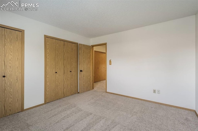 1559 Sausalito Dr, Colorado Springs, CO 80907 - unfurnished bedroom featuring carpet flooring and baseboards