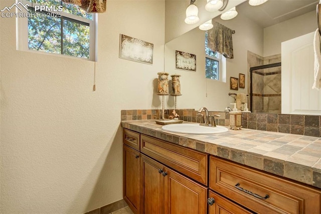 8396 Snow Cap Vw, Colorado Springs, CO 80920 - full bath featuring a stall shower and vanity