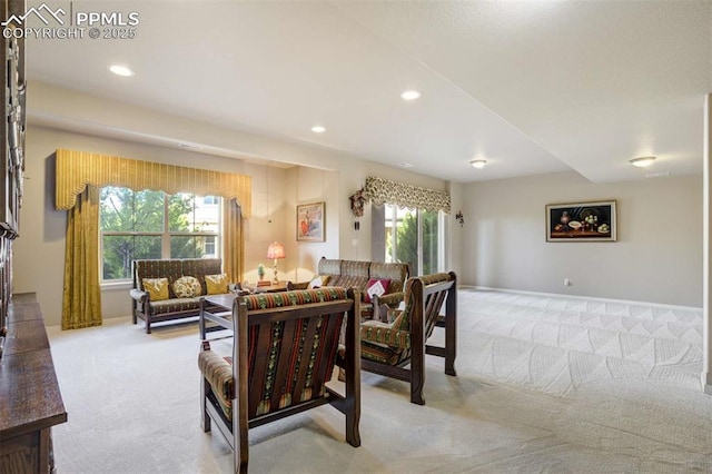 8396 Snow Cap Vw, Colorado Springs, CO 80920 - living room featuring light carpet and recessed lighting