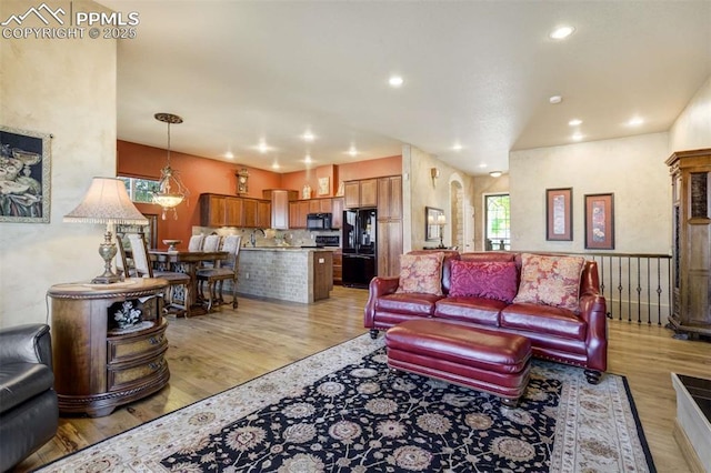 8396 Snow Cap Vw, Colorado Springs, CO 80920 - living area with light wood-type flooring and recessed lighting