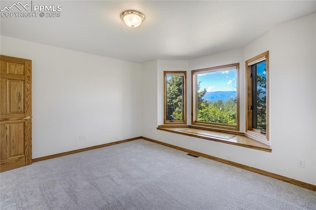 15635 Kingswood Dr, Colorado Springs, CO 80921 - spare room featuring carpet floors and baseboards