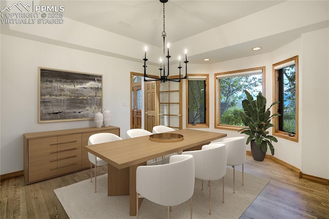 15635 Kingswood Dr, Colorado Springs, CO 80921 - dining space with a chandelier, light wood-style flooring, and recessed lighting