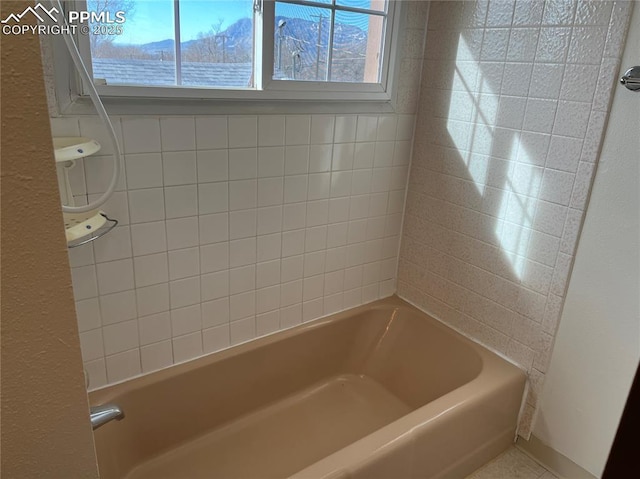 2354 E San Rafael St, Colorado Springs, CO 80909 - full bathroom featuring a tub to relax in and a shower