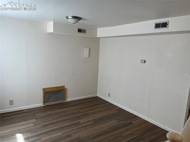 2354 E San Rafael St, Colorado Springs, CO 80909 - spare room with wood finished floors and baseboards