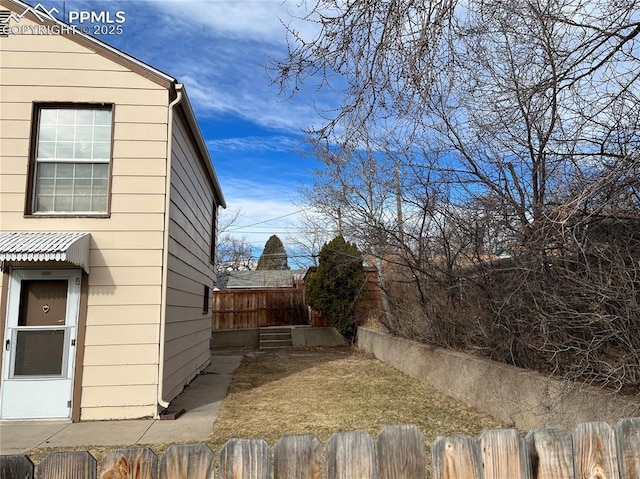 2354 E San Rafael St, Colorado Springs, CO 80909 - view of side of property featuring a fenced backyard