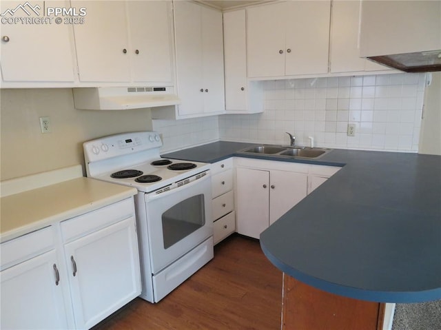 2354 E San Rafael St, Colorado Springs, CO 80909 - kitchen with under cabinet range hood, white electric range, a sink, and white cabinets
