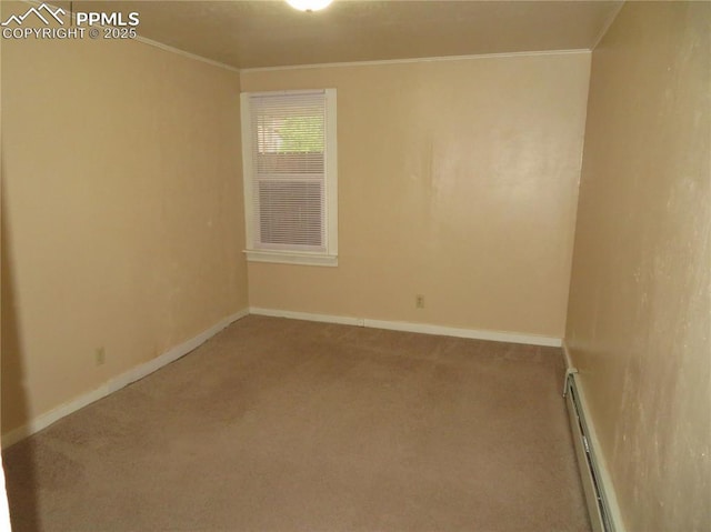 2354 E San Rafael St, Colorado Springs, CO 80909 - carpeted empty room with ornamental molding, baseboards, and baseboard heating