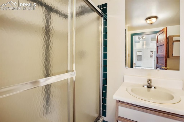 206 N 4th St, Victor, CO 80860 - bathroom with a stall shower and vanity