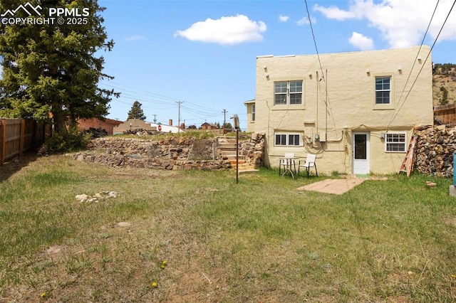 206 N 4th St, Victor, CO 80860 - back of house featuring stucco siding