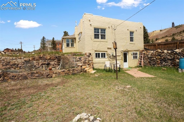 206 N 4th St, Victor, CO 80860 - back of property with stucco siding