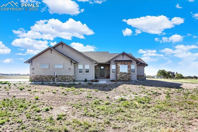 7871 Bannockburn Trl, Colorado Springs, CO 80908 - ranch-style home featuring stone siding and stucco siding