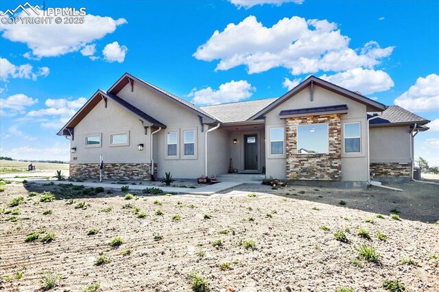 7871 Bannockburn Trl, Colorado Springs, CO 80908 - ranch-style house with stone siding and stucco siding