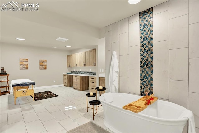 7871 Bannockburn Trl, Colorado Springs, CO 80908 - full bathroom with tile patterned flooring, a freestanding bath, vanity, and recessed lighting