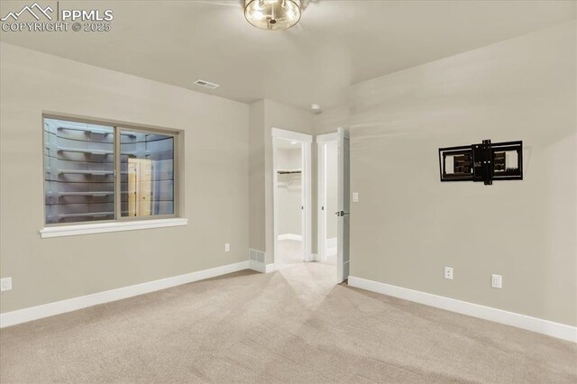 7871 Bannockburn Trl, Colorado Springs, CO 80908 - carpeted empty room with baseboards