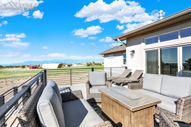 7871 Bannockburn Trl, Colorado Springs, CO 80908 - view of patio with outdoor lounge area and a balcony