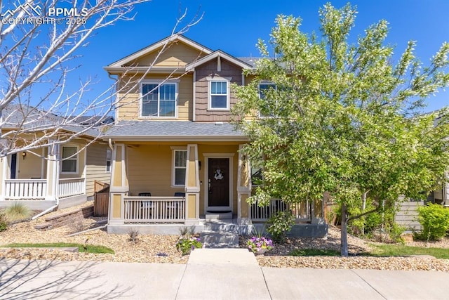 3793 Cadence Dr, Castle Rock, CO 80109 - view of front of house with covered porch and roof with shingles