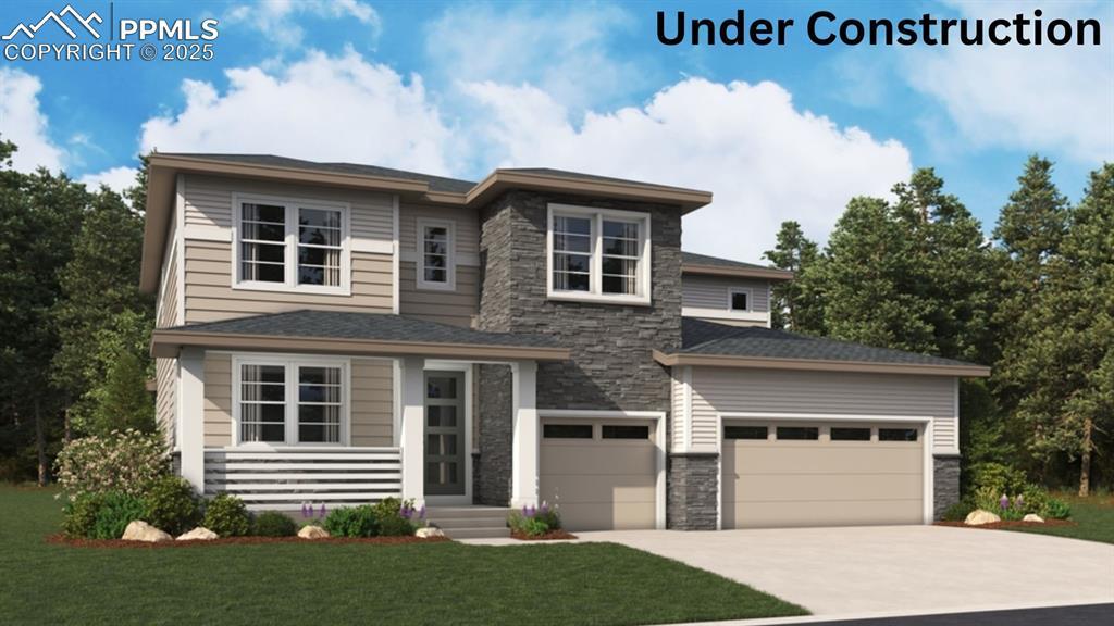 prairie-style home featuring stone siding, concrete driveway, a front lawn, and a garage