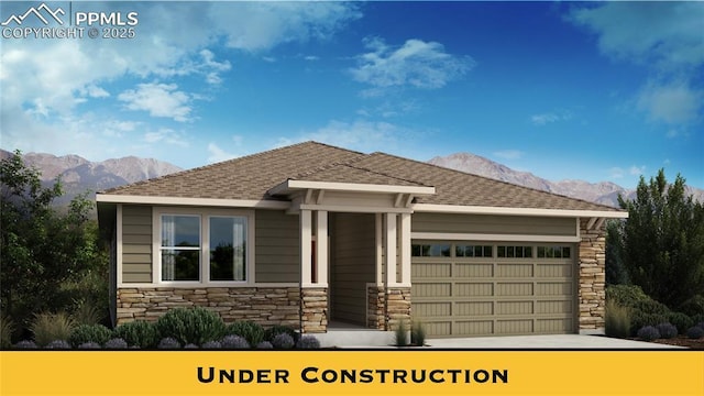 6045 Miller Run Pl, Colorado Springs, CO 80924 - view of front of house with stone siding, a mountain view, a garage, roof with shingles, and driveway