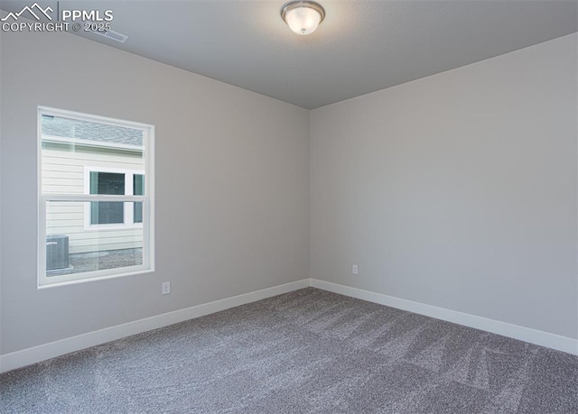 6045 Miller Run Pl, Colorado Springs, CO 80924 - unfurnished room with dark carpet and baseboards