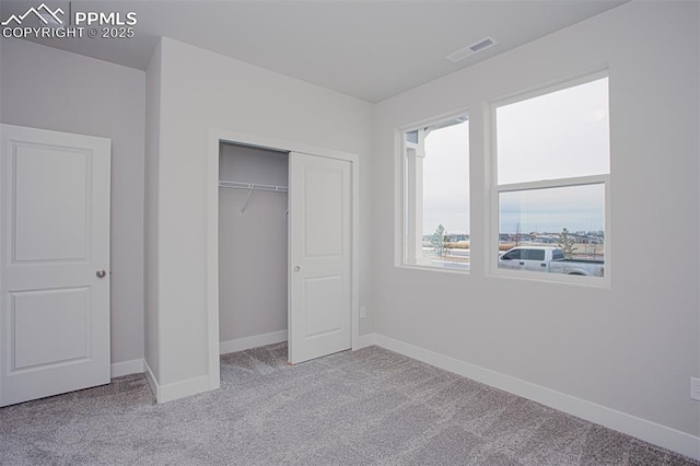6045 Miller Run Pl, Colorado Springs, CO 80924 - unfurnished bedroom featuring carpet, baseboards, and a closet