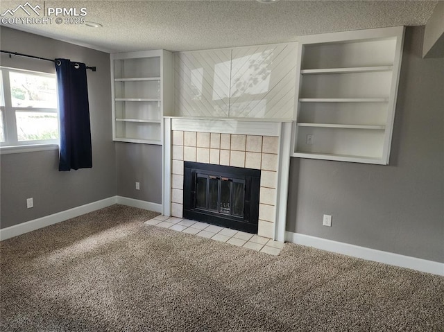 5427 Alteza Dr, Colorado Springs, CO 80917 - unfurnished living room with carpet floors, a fireplace, baseboards, and a textured ceiling