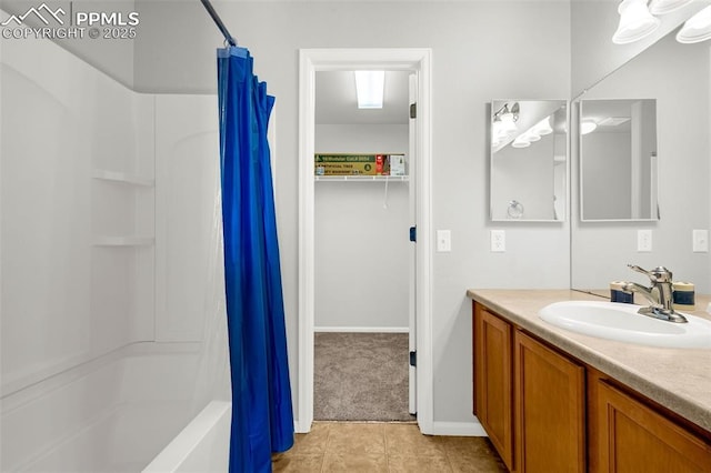 8147 Elk River Vw, Fountain, CO 80817 - bathroom with vanity, tile patterned floors, baseboards, and shower / tub combo with curtain